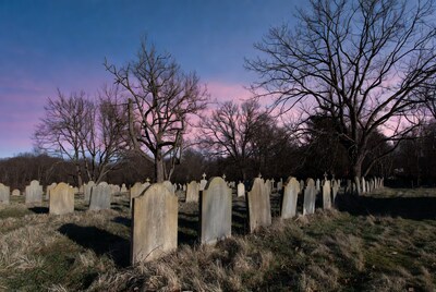 Graveyard at Sunset with Gravestones