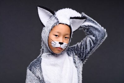 Asian boy in cat costume