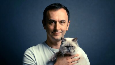 Man holding British Shorthair cat