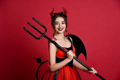 Girl in devil costume with trident