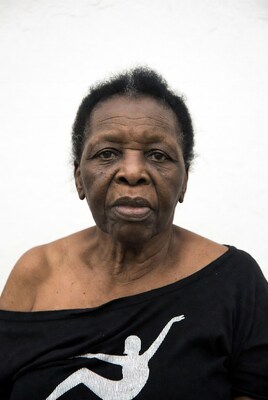Elderly African-American woman in black top