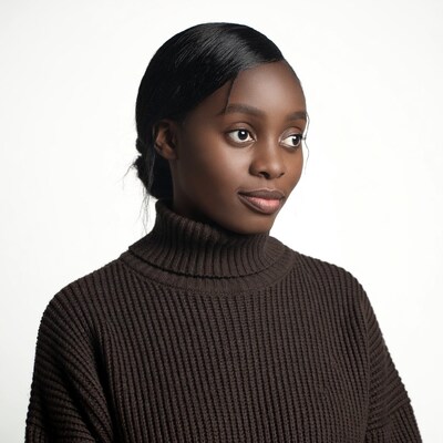 African-American woman in brown turtleneck