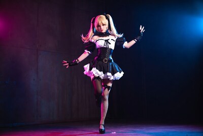 Asian woman in black white cosplay dress