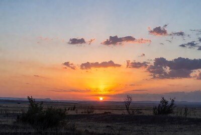 Sunset over African savanna plains