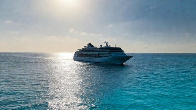 White Cruise Ship Sailing Turquoise Ocean
