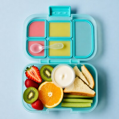 Open Bento Box with Fruits and Veggies