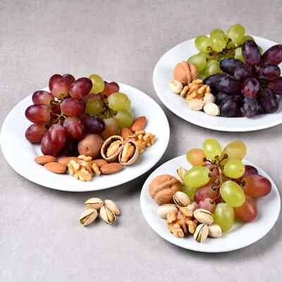 Grapes and Nuts on Plates