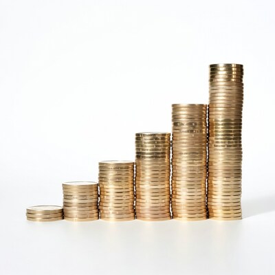 Stacks of gold coins in ascending order