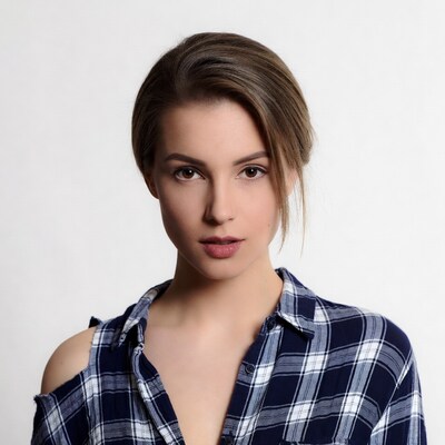 Woman in plaid off-shoulder shirt