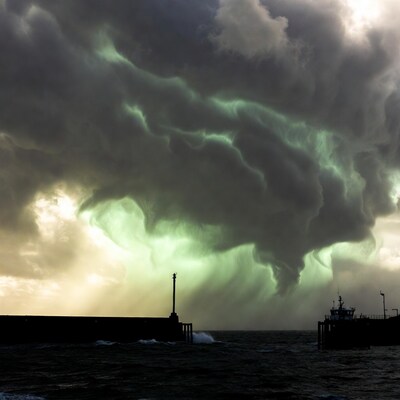 Greenish Storm Clouds over Harbor Breakwater