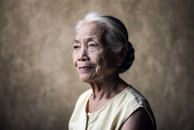 Elderly Asian woman profile view