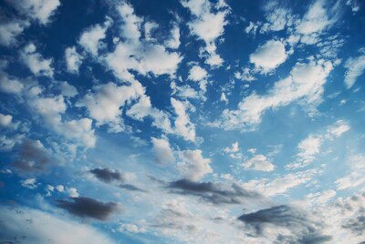 Fluffy Clouds in Blue Sky