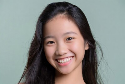 Smiling Asian girl with long black hair