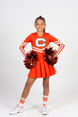 Latino girl in orange cheerleader uniform