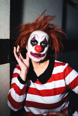 Woman in creepy clown makeup