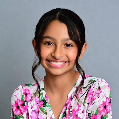 Smiling Asian girl in floral dress
