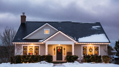 Christmas Lights Suburban House in Snow