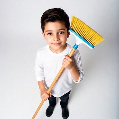Boy holding broom