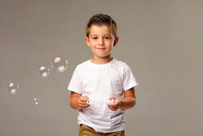 Boy holding bubble wand