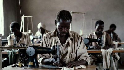 African men sewing on machines