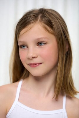 Young girl with blue eyes smiling