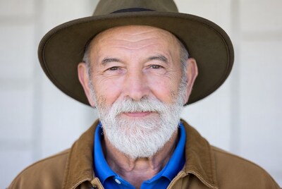 Elderly man in hat and jacket