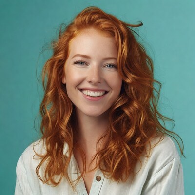 Smiling woman with red curly hair