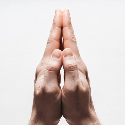 Praying hands in namaste position