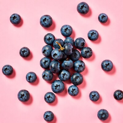 Blueberries on pink background
