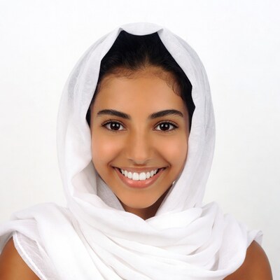 Smiling woman in white hijab