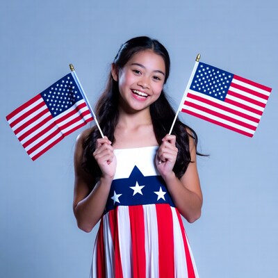 Asian girl holding American flags