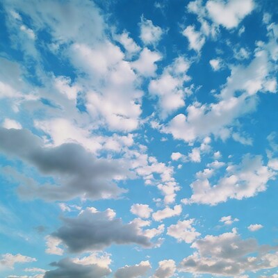 Fluffy Clouds in Blue Sky