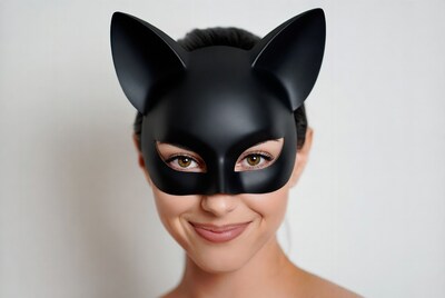 Woman wearing black cat mask
