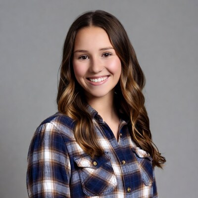 Smiling girl in plaid shirt