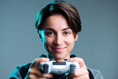 Woman holding PlayStation controller