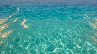Turquoise Ocean Water with Sun Glints