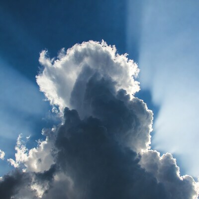 Cumulus clouds with sun rays