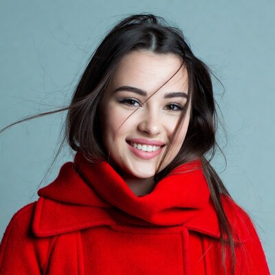 Smiling woman in red coat