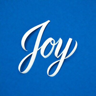 White Joy Typography on Blue Background