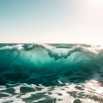 Massive turquoise ocean wave crashing