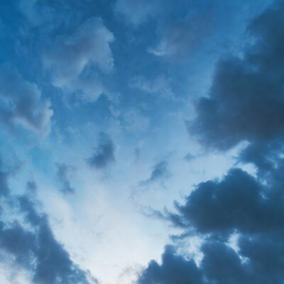 Blue sky with fluffy clouds