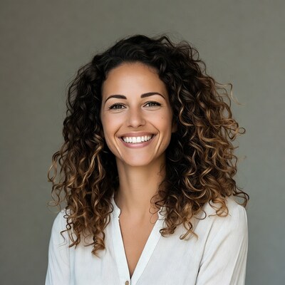 Smiling woman with curly hair