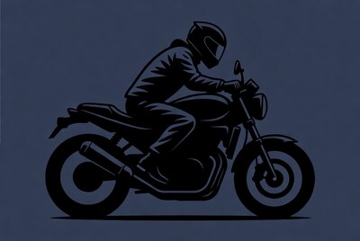 Man riding motorcycle silhouette