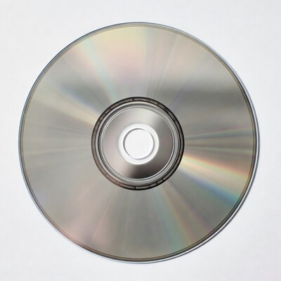 Shiny CD Disc on White Background