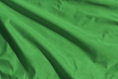 Green fabric texture close-up