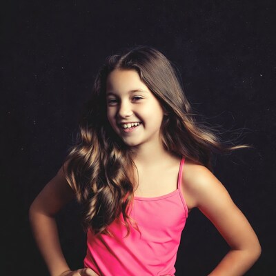 Smiling girl in pink tank top
