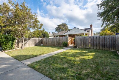 House with Wooden Fence and Gate