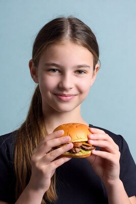 Girl holding burger