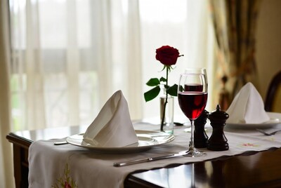 Romantic Table with Red Rose and Wine