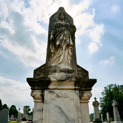 Stone Angel Statue on Cemetery Monument